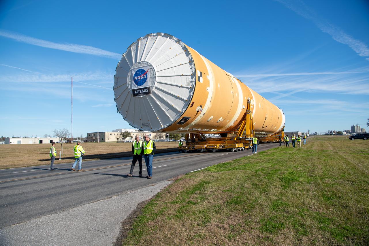 These images  show how teams rolled out, or moved, the completed core stage for NASA’s Space Launch System rocket from NASA’s Michoud Assembly Facility in New Orleans. Crews moved the flight hardware for the first Artemis mission to NASA’s Pegasus barge on Jan. 8 in preparation for the core stage Green Run test series at NASA’s Stennis Space Center near Bay St. Louis, Mississippi. Pegasus, which was modified to ferry SLS rocket hardware, will transport the core stage from Michoud to Stennis for the comprehensive core stage Green Run test series. Once at Stennis, the Artemis rocket stage will be loaded into the B-2 Test Stand for the core stage Green Run test series. The comprehensive test campaign will progressively bring the entire core stage, including its avionics and engines, to life for the first time to verify the stage is fit for flight ahead of the launch of Artemis I.  Assembly and integration of the core stage and its four RS-25 engines has been a collaborative, multistep process for NASA and its partners Boeing, the core stage lead contractor, and Aerojet Rocketdyne, the RS-25 engines lead contractor. Together with four RS-25 engines, the rocket’s massive 212-foot-tall core stage — the largest stage NASA has ever built — and its twin solid rocket boosters will produce 8.8 million pounds of thrust to send NASA’s Orion spacecraft, astronauts and supplies beyond Earth’s orbit to the Moon and, ultimately, Mars. Offering more payload mass, volume capability and energy to speed missions through space, the SLS rocket, along with NASA’s Gateway in lunar orbit and Orion, is part of NASA’s backbone for deep space exploration and the Artemis lunar program.